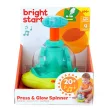 BRIGHT STARTS Zenélő, világító játék Press & Glow Spinner 6hó+