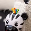 BABY EINSTEIN Rágóka csörgővel zebra Zen™ Shake-a-Shape BPA mentes 0hó+